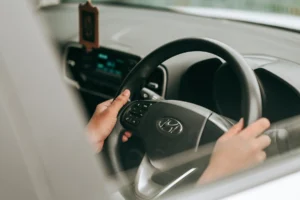Hands on a steering wheel